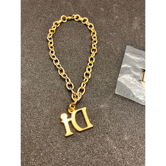 DIAMONDS INTERNATIONAL "Di" GOLD TONE LINK CHARM BRACELET AND Dolphin CHARM - Picture 3 of 8